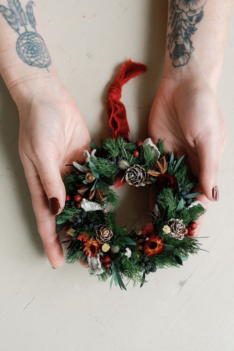 decoration mini dried flower wreath bauble held in hands for scale