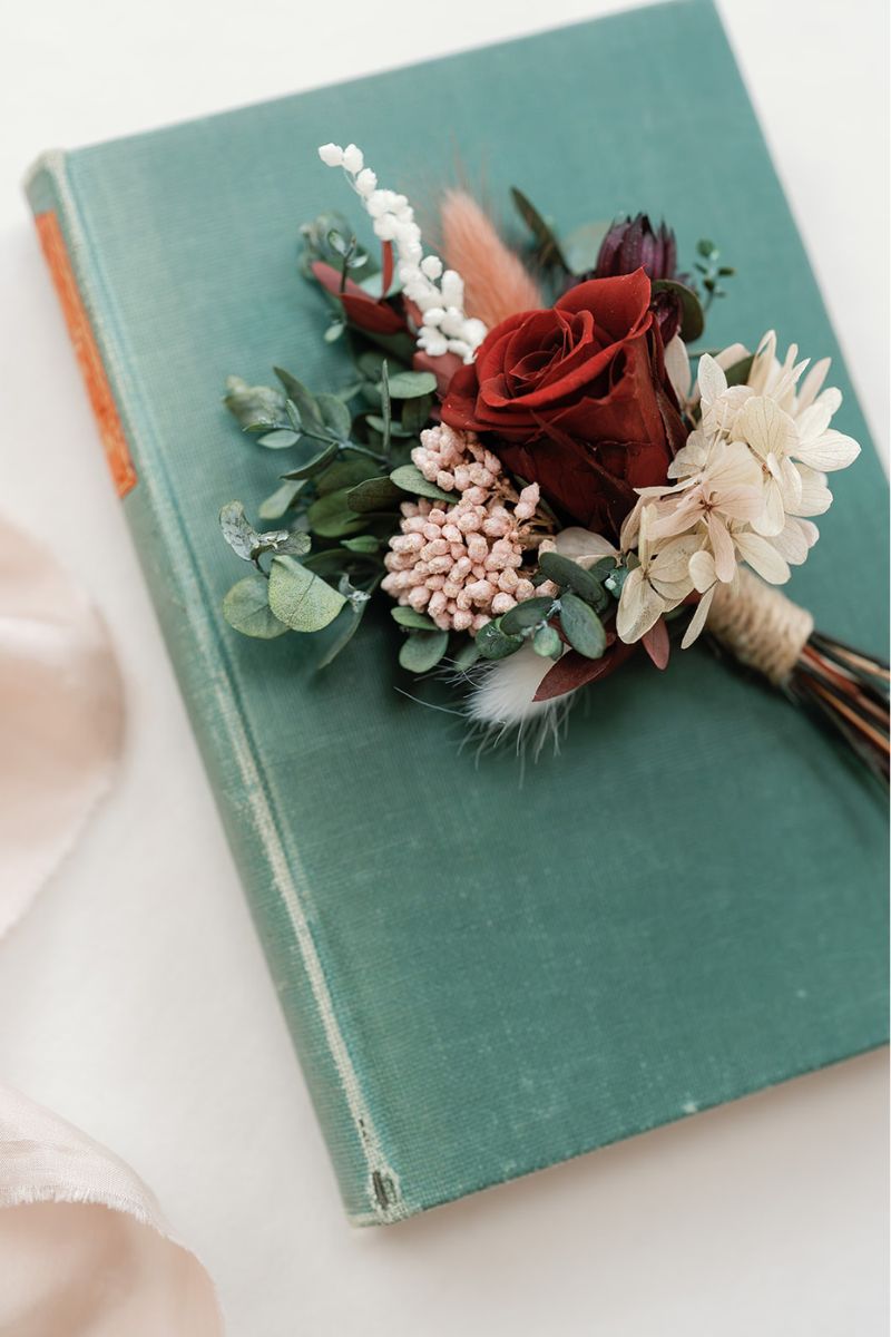 Preserved red rose buttonhole, dark, romantic and moody by Luna and Wild.