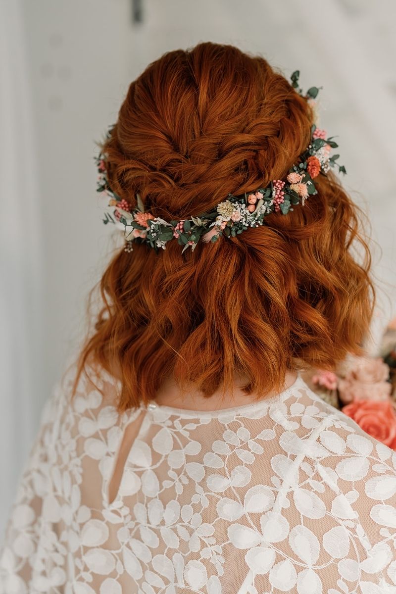 A delicate dried flower hair vine in coral, pink, white and green by Luna and Wild