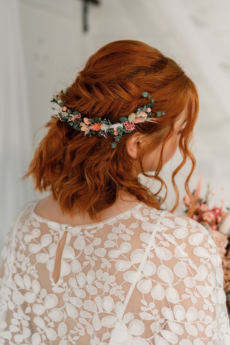 A delicate dried flower hair vine in coral, pink, white and green by Luna and Wild
