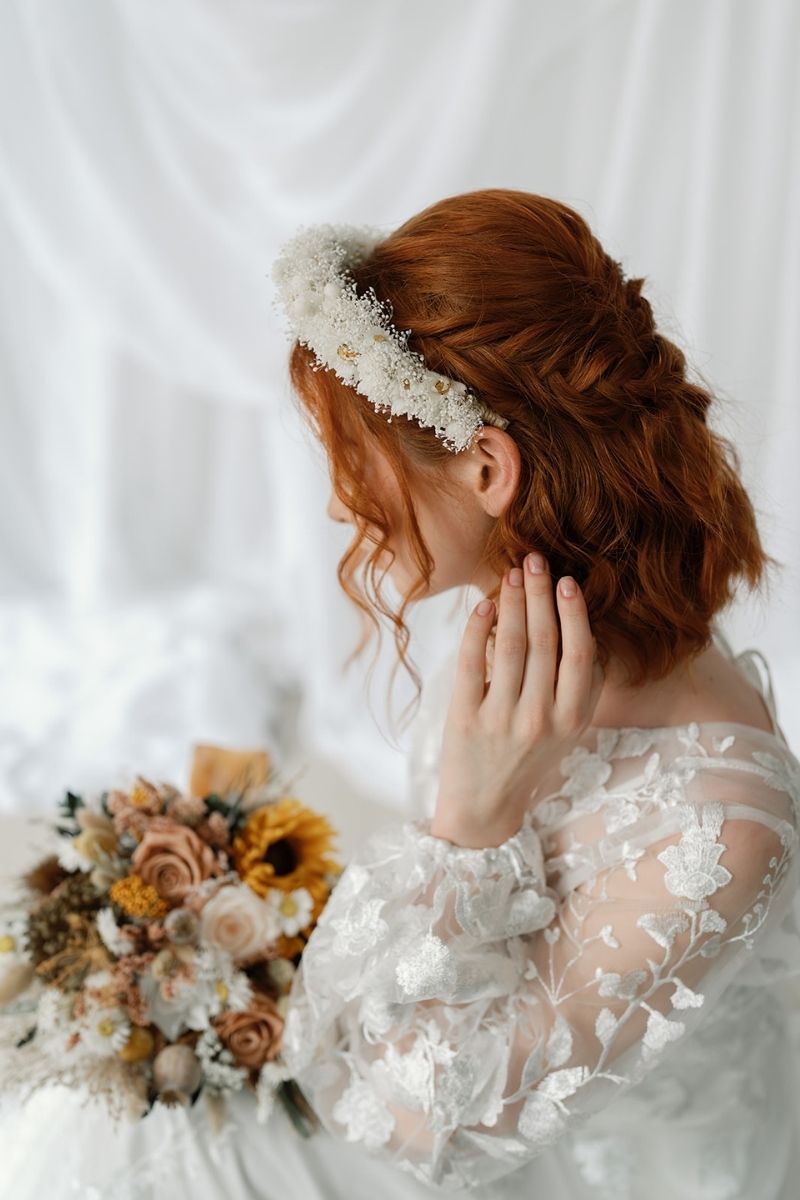 Ivory Daisy and gypsophila dried flower crown headband worn by a model with red short hair styled in a boho half up half down