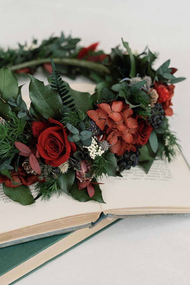 Ebony full circular preserved festive flower crown perfect for a winter wedding in rich red and green tones by Luna and Wild.