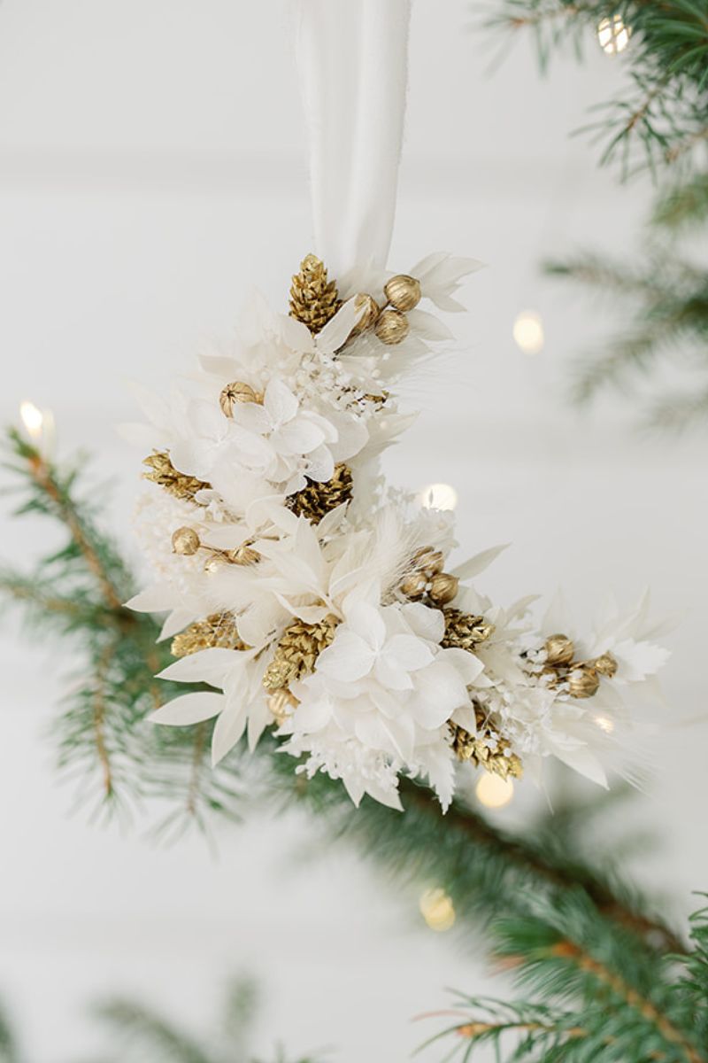 Gold and white crescent moon shaped Christmas bauble