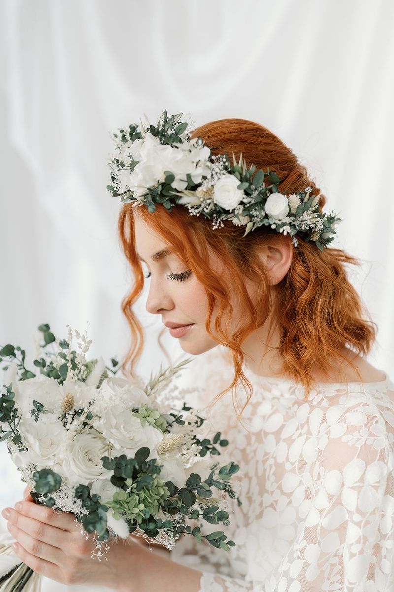 Preserved flower bridal bouquet with white peonies, roses and lime green hydrangea with lush eucalyptus foliage and finished with a silk ribbon around the stems