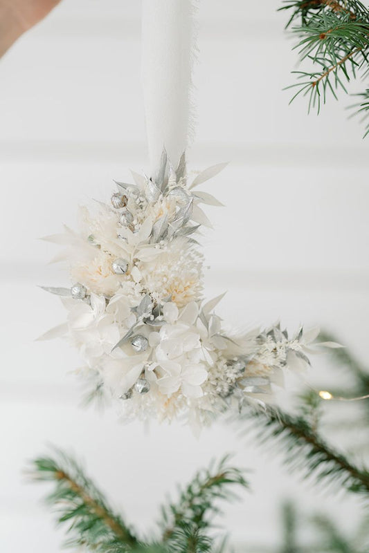 White and silver crescent moon shaped dried flower christmas bauble